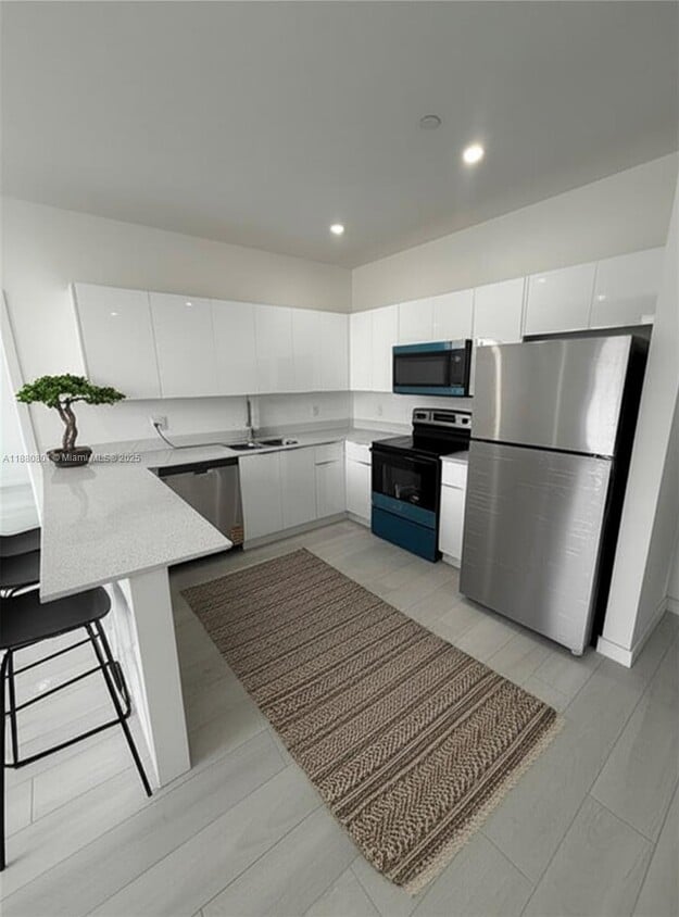 Photo - 1091 East 17th Street Apt #303, Hialeah, FL 33010 - 2 BR 2 BA townhouse