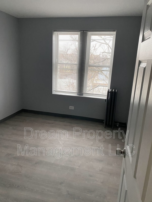 Building Photo - 7146 S Lowe Ave