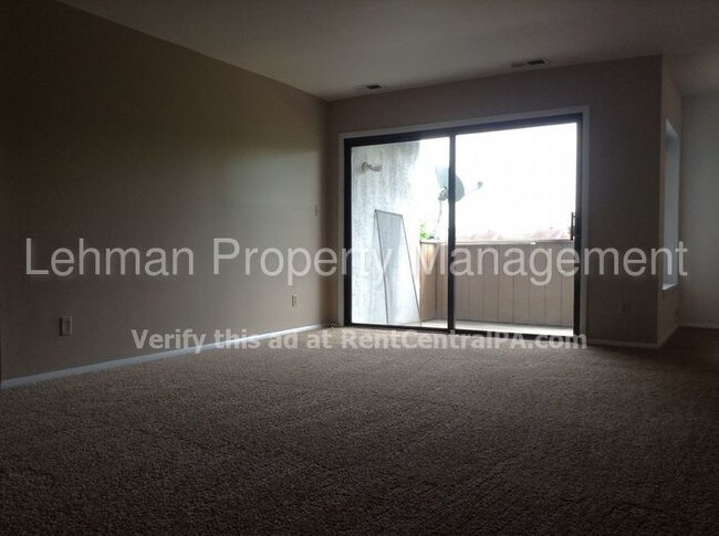 Building Photo - 810 Charlotte Way Unit 202