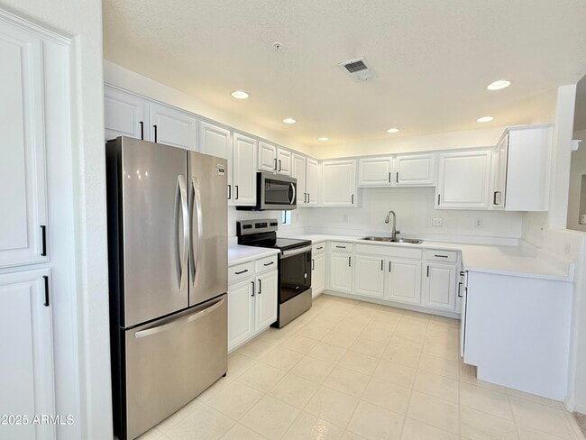 Building Photo - 9455 E Raintree Dr