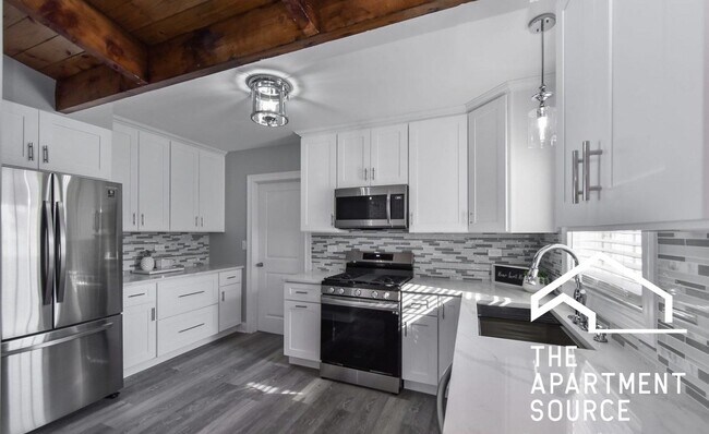 Foto del edificio - 702 Hammerschmidt Ave