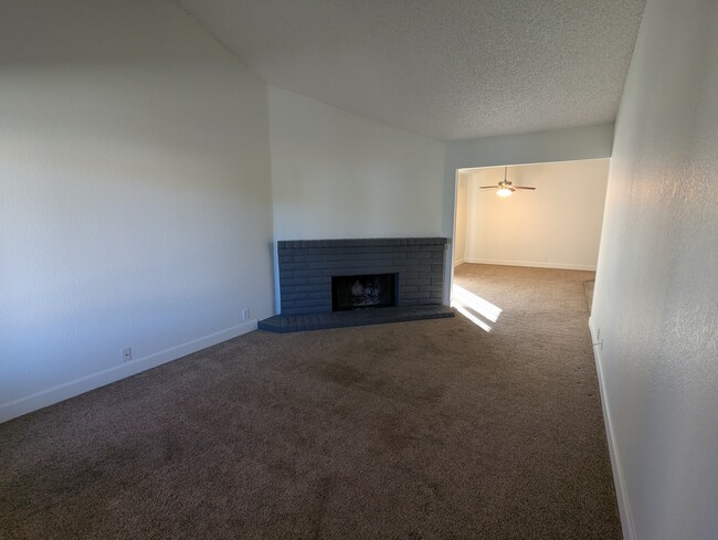 Living room with fireplace - 4918 Saddlerock Way