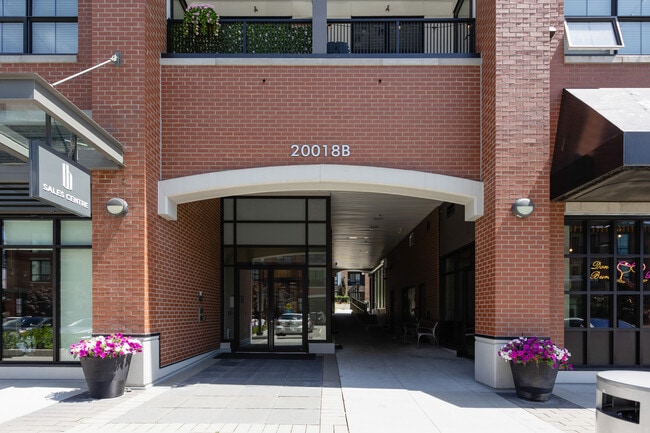 Building Photo - Modern & Bright 1-Bed Condo for Rent in Heart of Latimer Village, Langley