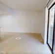 This 510 square foot apartment in Jacksonville, Florida, offers a thoughtful blend of comfort and functionality. The single-story layout comprises one bedroom, one bathroom, and an efficiently designed living space. The primary bedroom, measuring 130 square feet, provides ample space and is enhanced by a modern ceiling fan and natural light from a window with blinds.

The kitchen is a highlight, featuring contemporary white cabinetry, sleek countertops, and stainless steel appliances. A kitchen island with a sink adds extra preparation space and potential for casual dining. Light-colored hardwood flooring in the kitchen area transitions seamlessly to plush carpeting in the bedroom and living spaces, creating a cohesive feel throughout.

The bathroom boasts a clean, modern design with large format tiles, a combination tub and shower, and a single vanity. Two hallways and a closet contribute to the apartment's smart use of space. Throughout the unit, recessed lighting and large windows ensure bright, welcoming interiors.

This apartment, located at 4104 8715-2 Belle Rive Ap, offers a perfect balance of style and practicality for those seeking an efficient living space in Jacksonville's 32256 ZIP code.