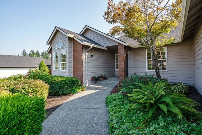Building Photo - Beautifully Landscaped 1/4 acre with Well Maintained 4 bedroom 2 Bath Home with 3 Car Garage