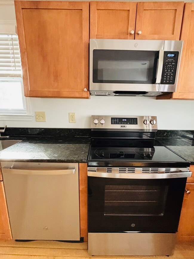 Updated kitchen with stainless steel appliances and garbage disposal - 11 Gifford Dr