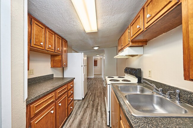 Building Photo - Coming Soon: 2 BR unit that includes water, trash, and yard care.