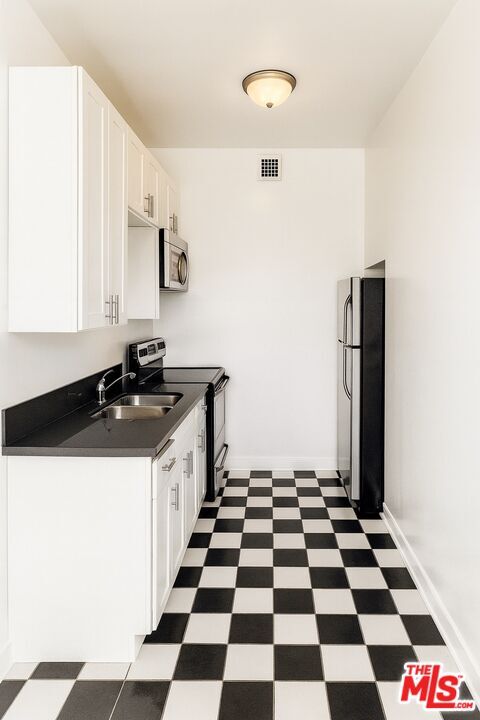 Foto del edificio - 1201 N Crescent Heights Blvd