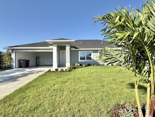 Front view with spacious two car garage - 5021 24th St SW