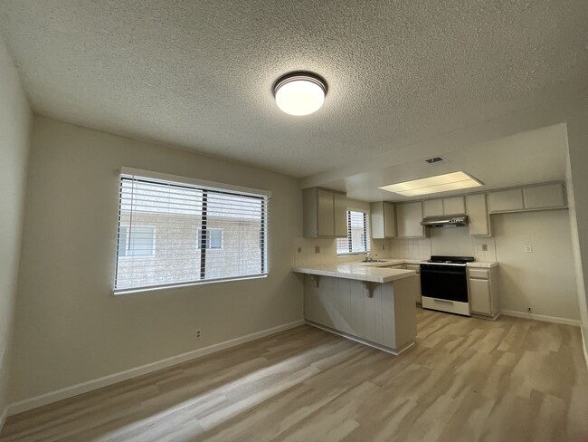 dining and kitchen area - 218 N Marguerita Ave