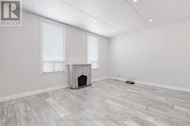 Building Photo - 741 Queen St E