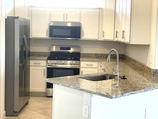 Building Photo - New Construction 2 Bedroom PLUS a Home Office Available in Lorraine Lakes