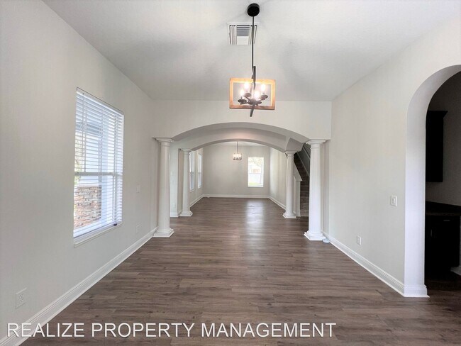 Building Photo - 6 br, 5 bath House - 7121 Blue Indigo Cres