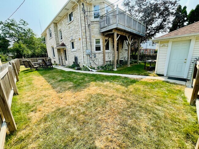 Fenced in yard. - 1220 E Kensington Blvd