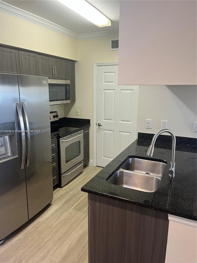 Building Photo - 6492 Emerald Dunes Dr
