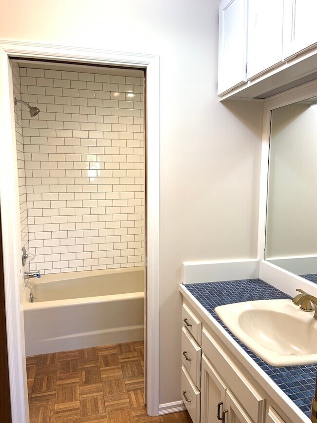 Second bathroom with newly renovated tiled shower - 342 NE Beyrl Ter