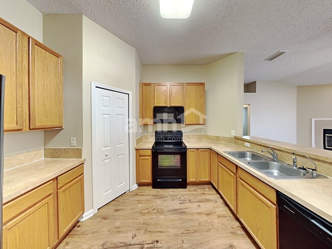 Building Photo - 6815 Rapid River Dr