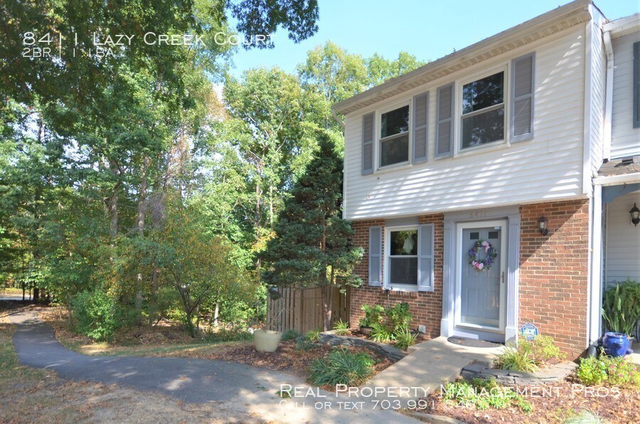 Primary Photo - Charming, Sunny End Unit! Huge Fenced Yard!