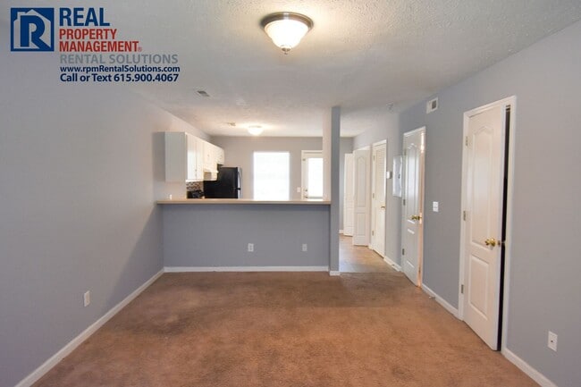 Building Photo - 2 Story Brick Duplex- Walk to MTSU! All fresh paint and flooring, washer & dryer included!