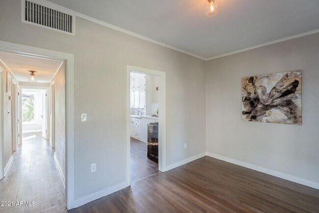 Look into kitchen and hallway from DR - 91 W Willetta St