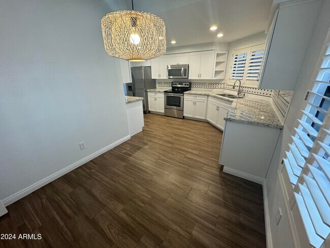 Building Photo - 9628 E Sutton Dr