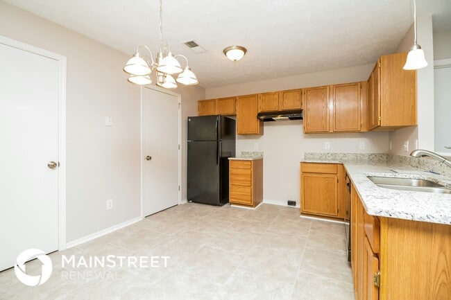 Building Photo - 7218 Hidden Lake Dr