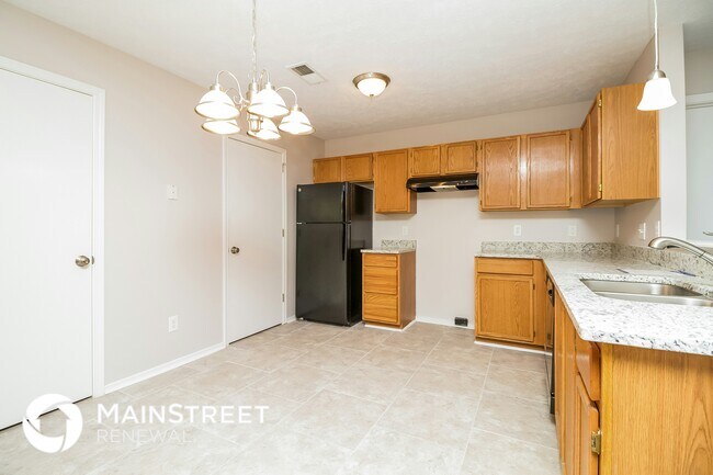 Foto del edificio - 7218 Hidden Lake Dr