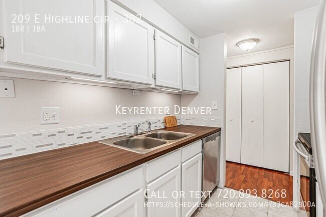 Foto del edificio - Charming 1-Bedroom Condo with Balcony in A...