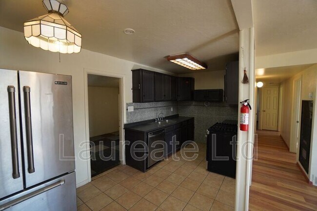 Building Photo - 6111 E 60th Ave