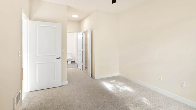 Carpeted Bedroom - South City Station