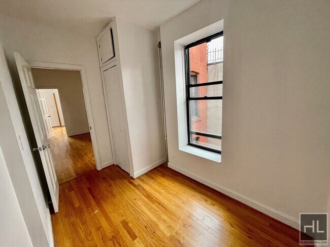Building Photo - SUNNY 3 BEDROOM ON EAST 7 STREET