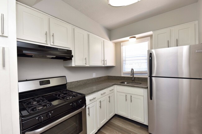 Kitchen + Granite Counters - The Enclave