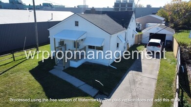 Building Photo - 1521 W Alexis Rd