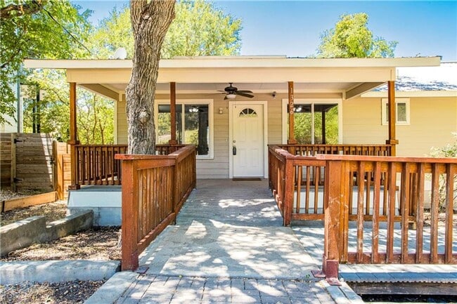 Building Photo - Stunning Renovation - New Hardwood flooring, tile in Kitchen. Granite countertops, breakfast bar