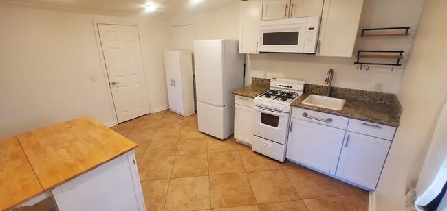 Tile floors in kitchen/ dining room - 152 Redfield Ave