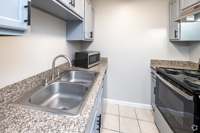 1HAB, 1BA - 770 ft²- Cocina - City View Apartments