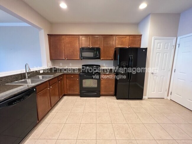 Building Photo - 6937 Woody Vine Dr