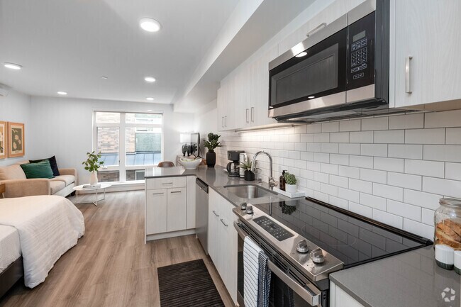 STU - 423SF - Cocina y sala de estar - Plaid Apartments