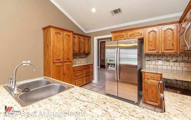 Building Photo - 4 br, 2.5 bath House - 2424 Bristol Ct.