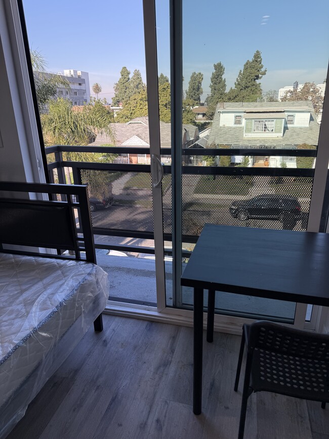 bedroom with city view - 1110 W 40th Pl