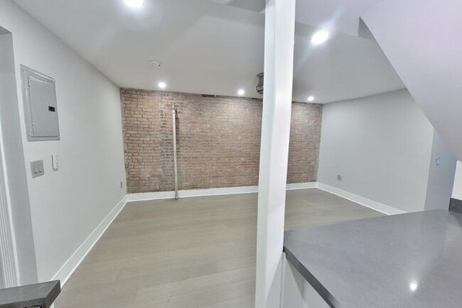 Photo - 411 E 12th St Apartment