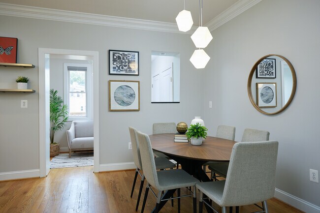Directly off of the kitchen is the cozy dining room. - 4606 Iowa Ave NW