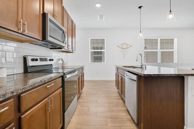 Building Photo - 3280 Canna Lily Pl