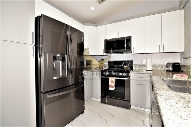 Foto del edificio - 5415 W Harmon Ave