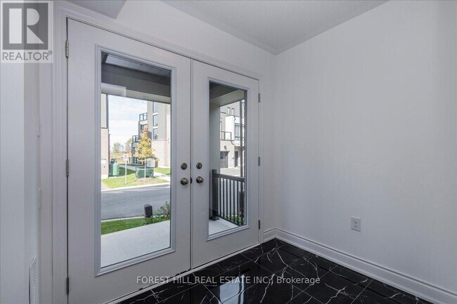 Photo du bâtiment - 119 Marina Village Dr