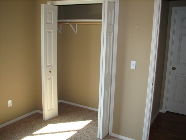 bedroom 2 and 3 closet - 318 Rosehaven Street