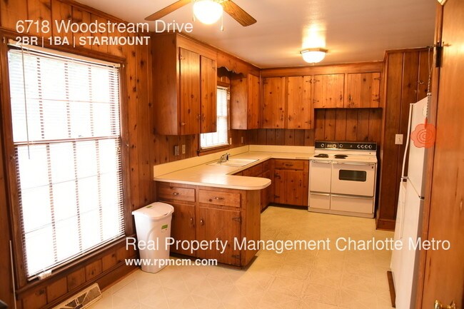 Building Photo - 6718 Woodstream Dr