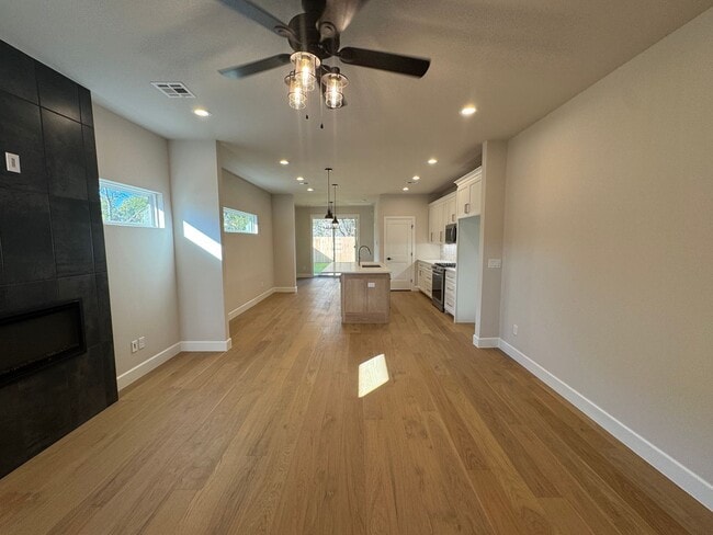 Building Photo - BRAND NEW - 4 bed - 3 bath - 2 car with fenced yard!