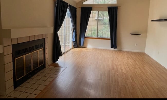 Spacious Sunny living room with wood fireplace - 6036 Gunbarrel Ave