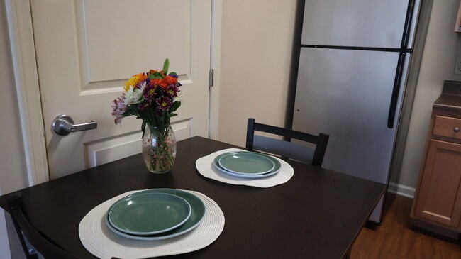 Fully Furnished Apartments With Stylish Finishes and Comfortable Shared Living Spaces - Walden Station Apts